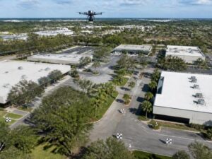 Survey drone mapping a multi-building commercial property with ground control targets in Hollywood, Florida.